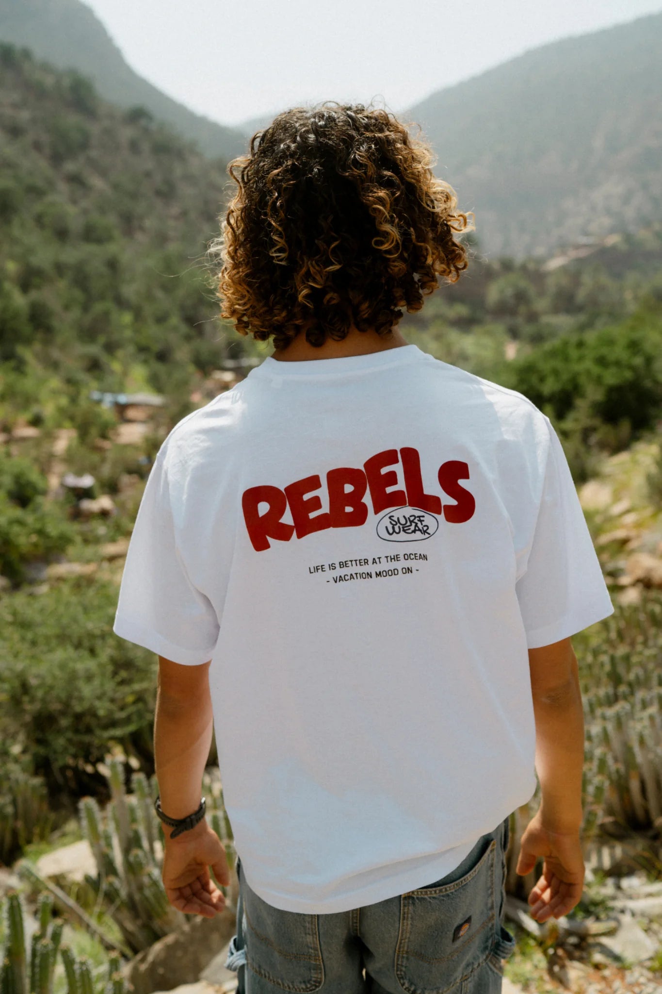 Rebels Surf Wear oversized t-shirt white back view desert cactus landscape