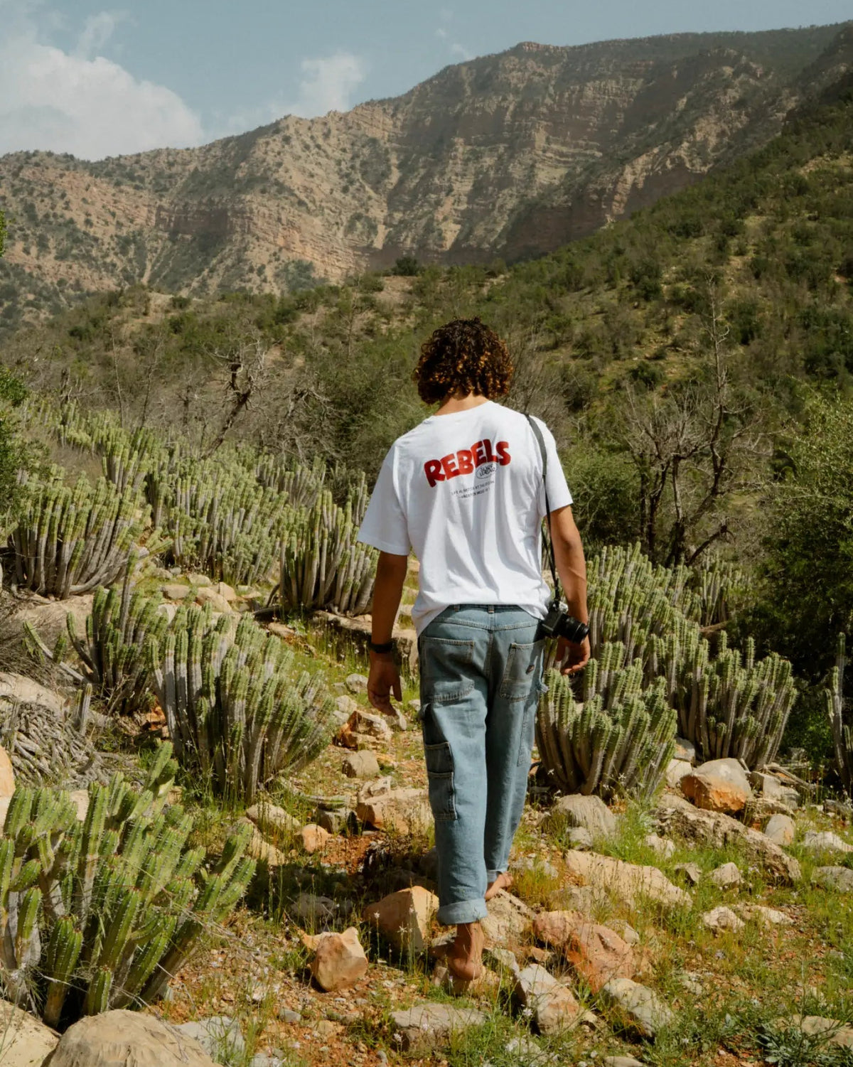Rebels Surf Wear oversized t-shirt white back view mountain desert lifestyle