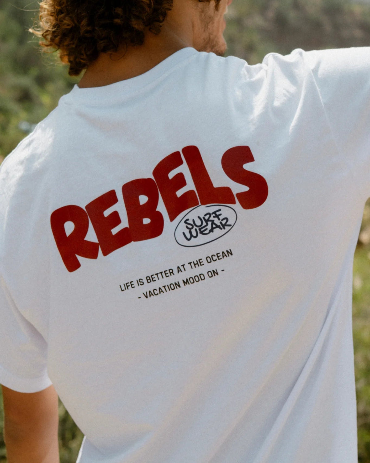 Rebels Surf Wear oversized t-shirt white logo close up back print